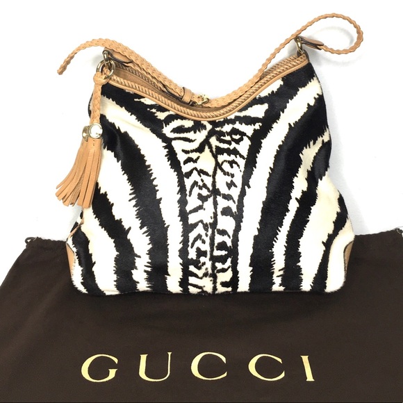 Gucci Handbags - Authentic Gucci Zebra fur hobo bag with brown leather trims